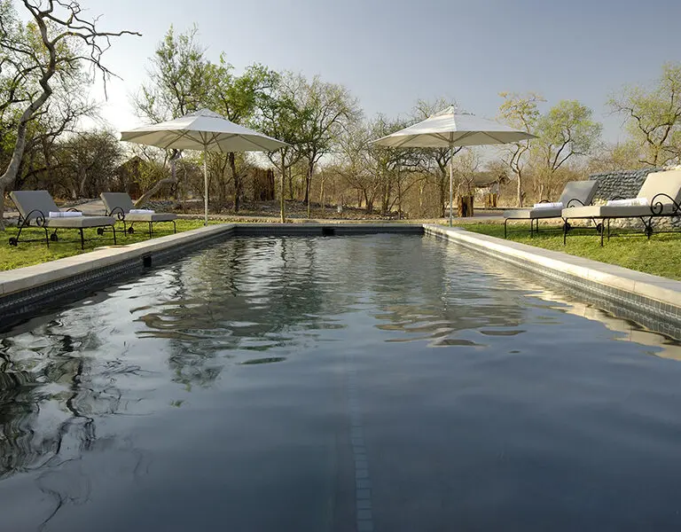 Cool off in the inviting swimming pool.