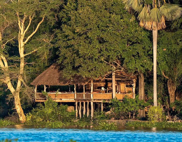 Set in Malawi's Liwonde National park, overlooking a lagoon on the Shire River. 