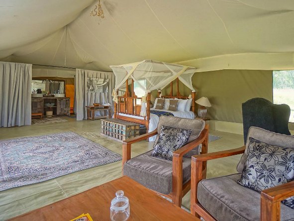 Nasikia Naona Moru Camp offers an exclusive safari experience & luxury tented accommodation in central Serengeti.
