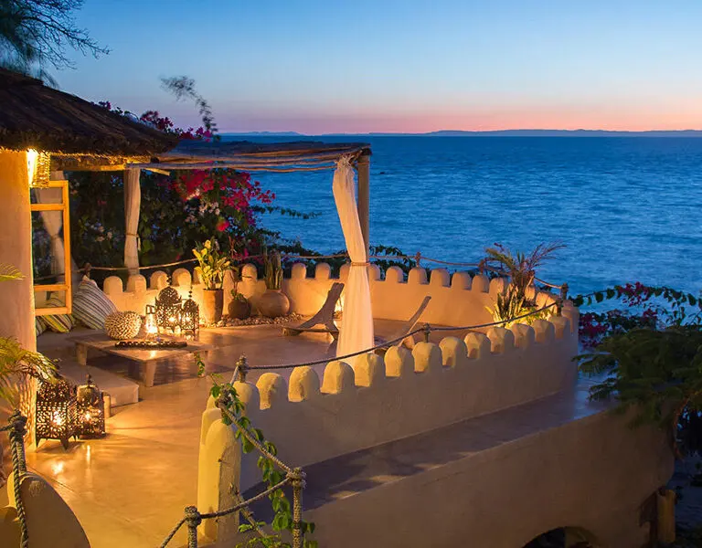 Watch the sun sink beneath the horizon as the afternoon turns to evening.