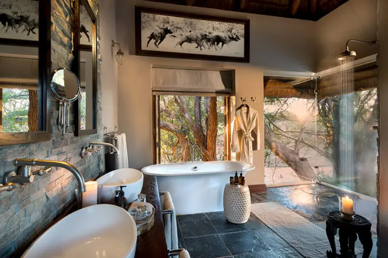 En suite bathroom with separate indoor shower.