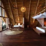 Thatched 'Bandas' at Nile Safari Lodge create a comfotable yet authentic safari feel.