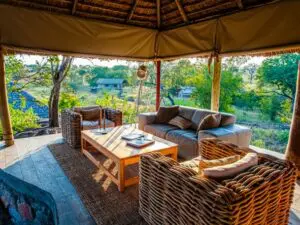 This canvas, thatch and timber lodge is well-appointed and has a lovely setting at a seasonal river.
