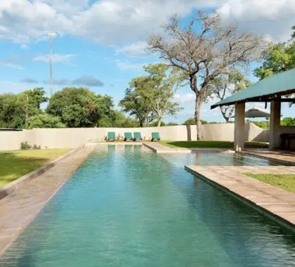 Spend afternoons at the pool after a day of game viewing and exploring.
