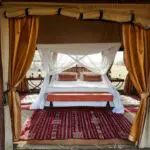Start the day with Serengeti views from the comfort of your enormous bed.
