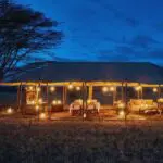A lantern-lit mess tent awaits guests at the end of the day for drinks, dinner & a safari story or two.
