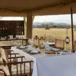 The simple design of the mess tent belies the sophisticated cuisine served under its cool canvas.
