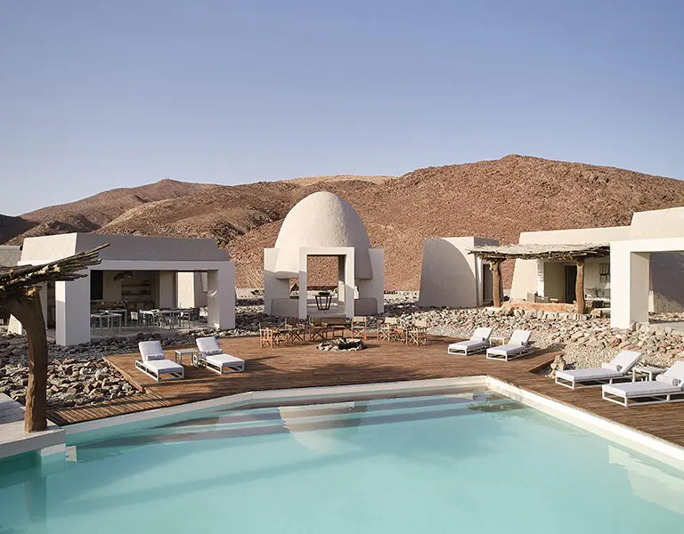 Uniquely-designed Okahirongo Elephant Lodge, an A&K Sanctuary, an oasis in the desert.