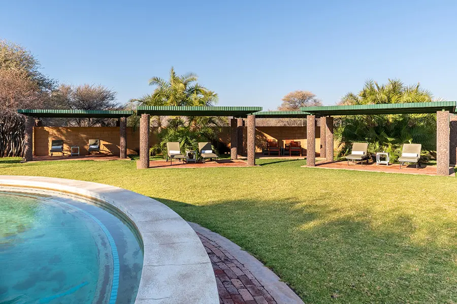 Relax on the pool loungers. 