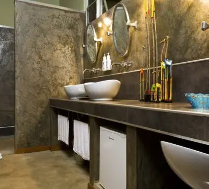The en-suite bathrooms are spacious and luxurious, with his & her washstands.