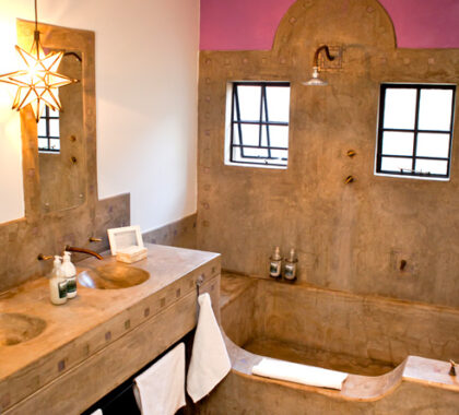 The en-suite bathrooms are cast out of polished cement, adding a modern feel to your experience here.
