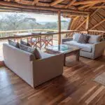 Lounge area and interleading deck with view.