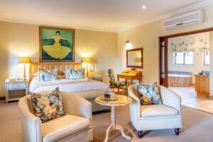 Una habitación de lujo en Oliver's Restaurant & Lodge.