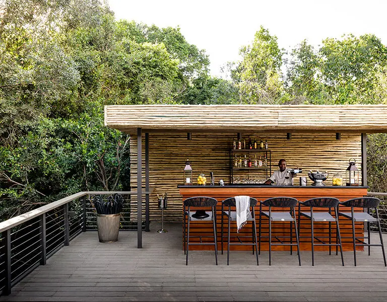 Enjoy a drink from the bar.