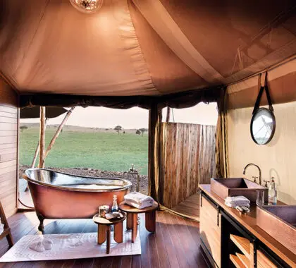 Twin vanities and copper free-standing bathtubs.