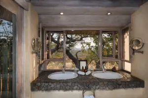 En suite bathroom featuring a double hand basin.