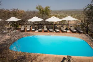 Take a refreshing dip in the lodge's swimming pool.