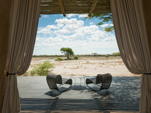 Step out of your suite & onto your viewing deck with the Onguma Private Reserve in front of you.