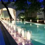 In the night the pool will be beautiful decorated.
