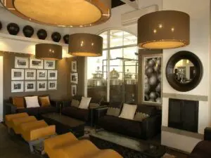 The lounge offers a cozy fireplace and comfortable couches.
