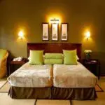 The spacious bedroom adds a relaxing atmosphere to your stay.