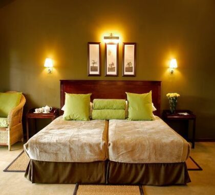 The spacious bedroom adds a relaxing atmosphere to your stay.