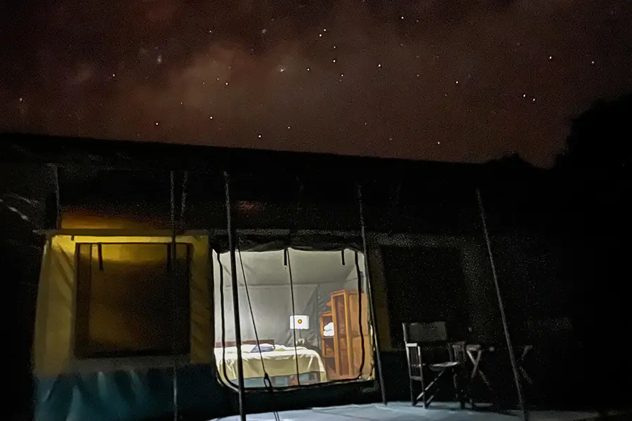 porini-rhino-camp_guest-tent-by-night-stargazing