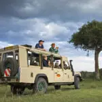 Los vehículos de safari de Porini tienen el techo y los laterales abiertos para ofrecer a los visitantes grandes oportunidades fotográficas.