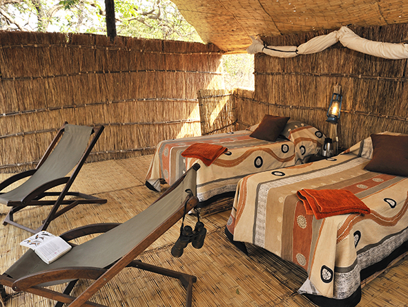 Each chalet is simple yet comfortable, and the raised position means you can enjoy spectacular views of the acacia grove which lies in front of the camp. 