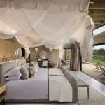 Unwind in absolute comfort at Lion Sands River Lodge.
