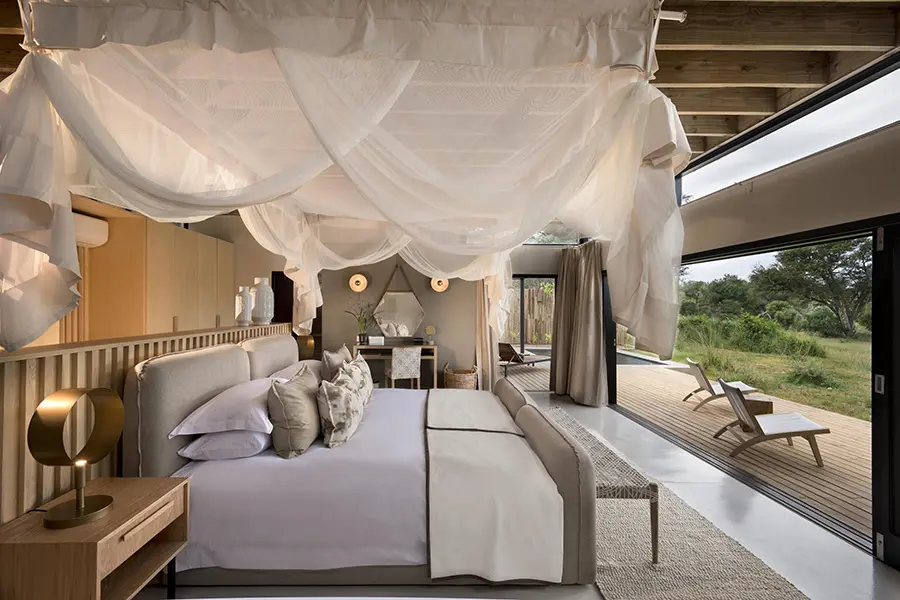 Unwind in absolute comfort at Lion Sands River Lodge.