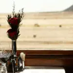 Dine as you pass through the desert on Rovos Rail. 