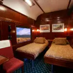 A Deluxe Suite with split twin beds.