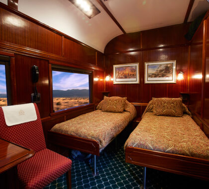 A Deluxe Suite with split twin beds.
