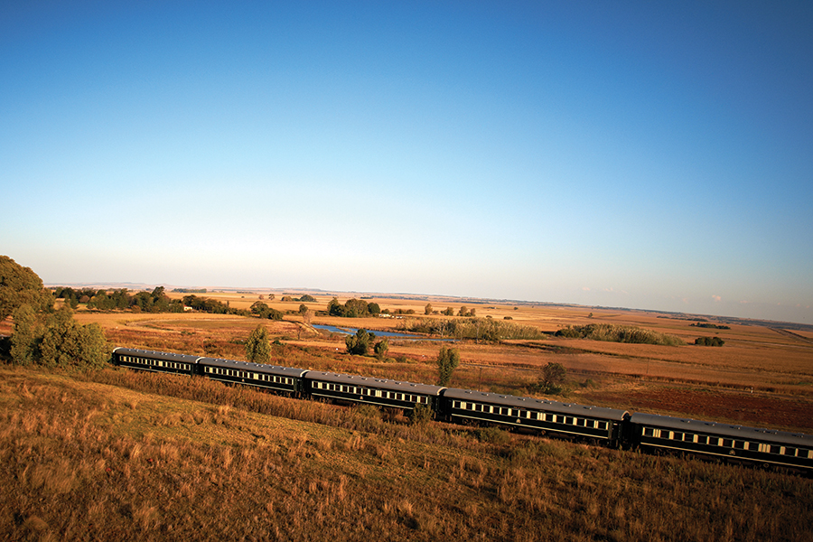 Train through wide open landscapes.