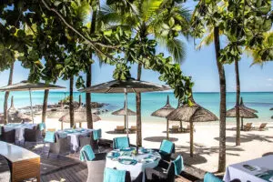 The Royal Palm enjoys a sheltered setting on one of the sunniest beaches in Mauritius.