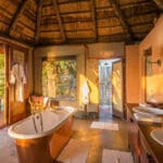 Each en-suite bathroom has a classic copper bathtub and romantic outdoor shower.
