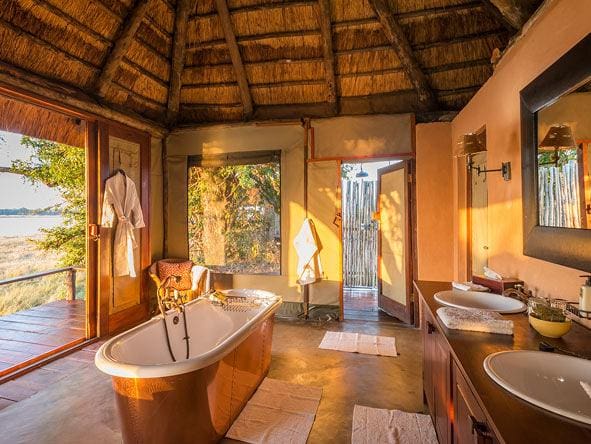 Each en-suite bathroom has a classic copper bathtub and romantic outdoor shower.