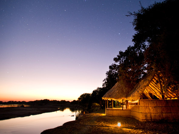 Set on the Luangwa River, Tafika Camp mixes walking safaris with game drives & even microlight flights.