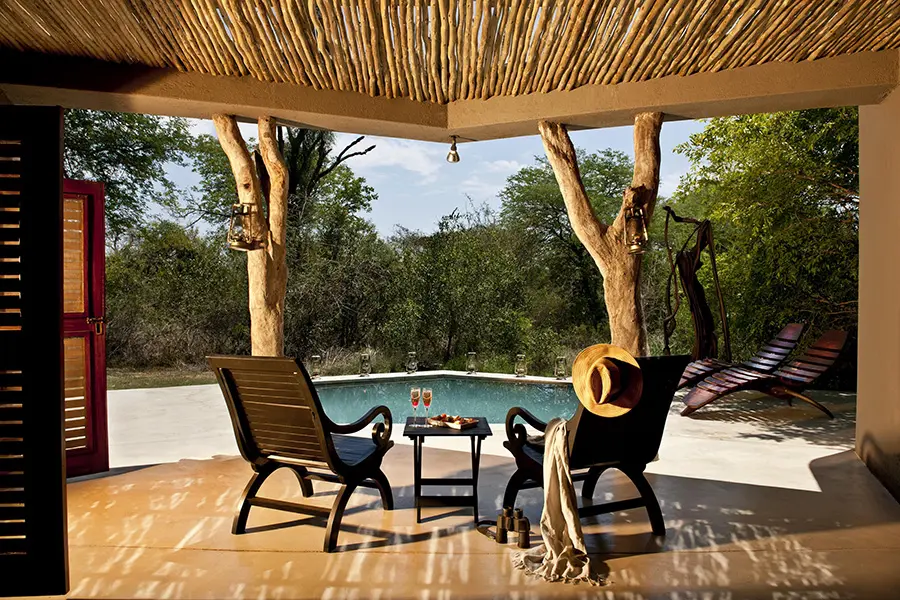 Lounge on the private pool deck in the luxurious Mandleve Deluxe Suite. 