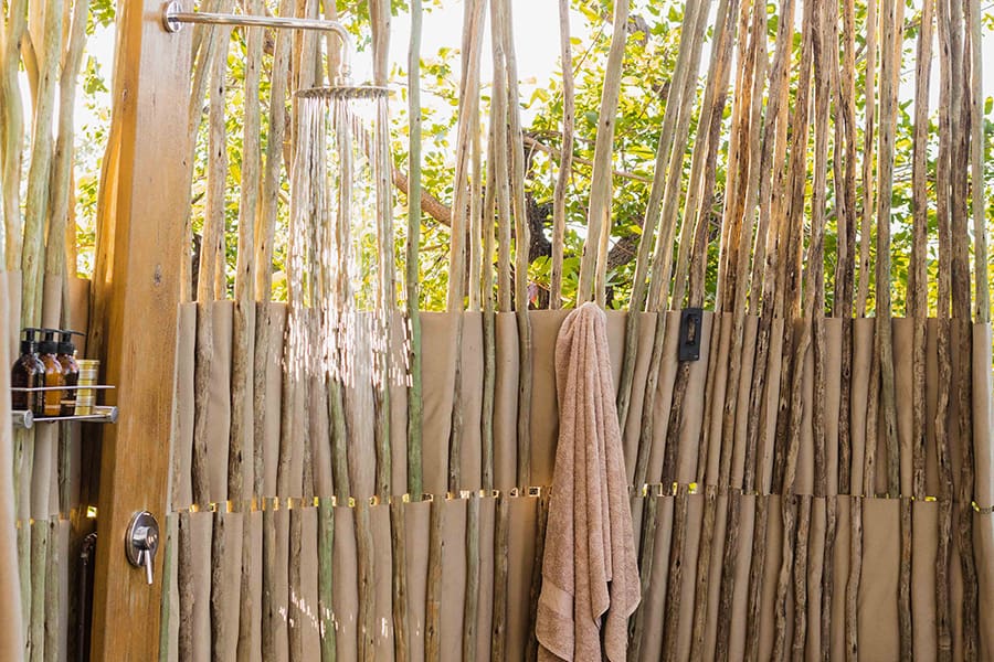 sable-alley-natural-selection-botswana-khwai-private-reserve-okavango-delta-_guest-tent-outdoor-shower-1