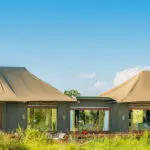 Located next to the Sand River.