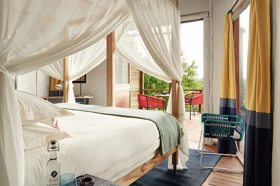 Bedroom interior at Sanctuary Baines Camp.