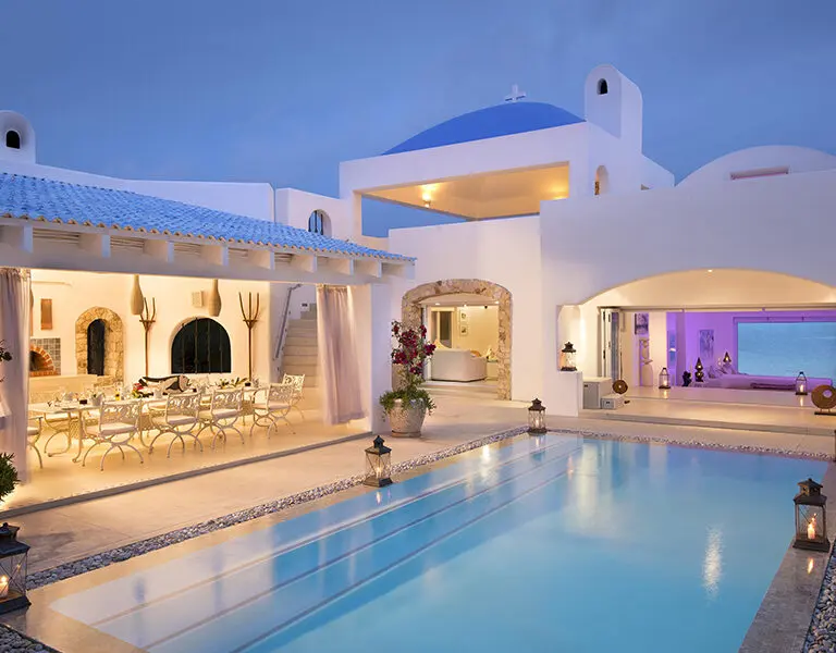 Ever busy during the day, the villa's pool area is a popular evening dining venue.