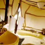 The en-suite bathrooms are also uniquely constructed, with hand-crafted bathtubs and special metallic detail.