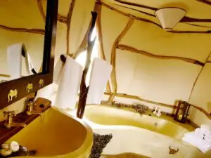 The en-suite bathrooms are also uniquely constructed, with hand-crafted bathtubs and special metallic detail.