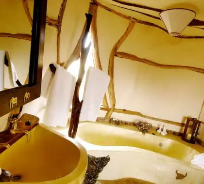 The en-suite bathrooms are also uniquely constructed, with hand-crafted bathtubs and special metallic detail.