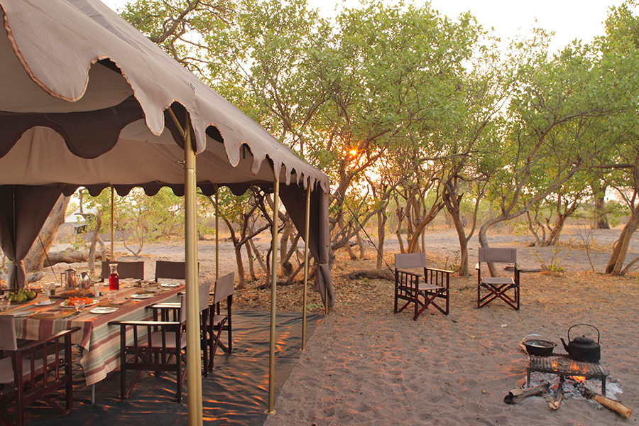 Traditional safari suppers served in the shady dining tent.