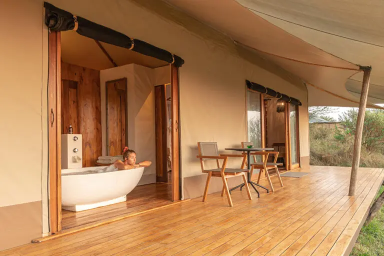 Al fresco tubs and verandas at Sayari Camp.