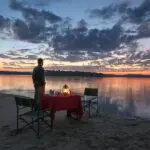 Cena a orillas del río
